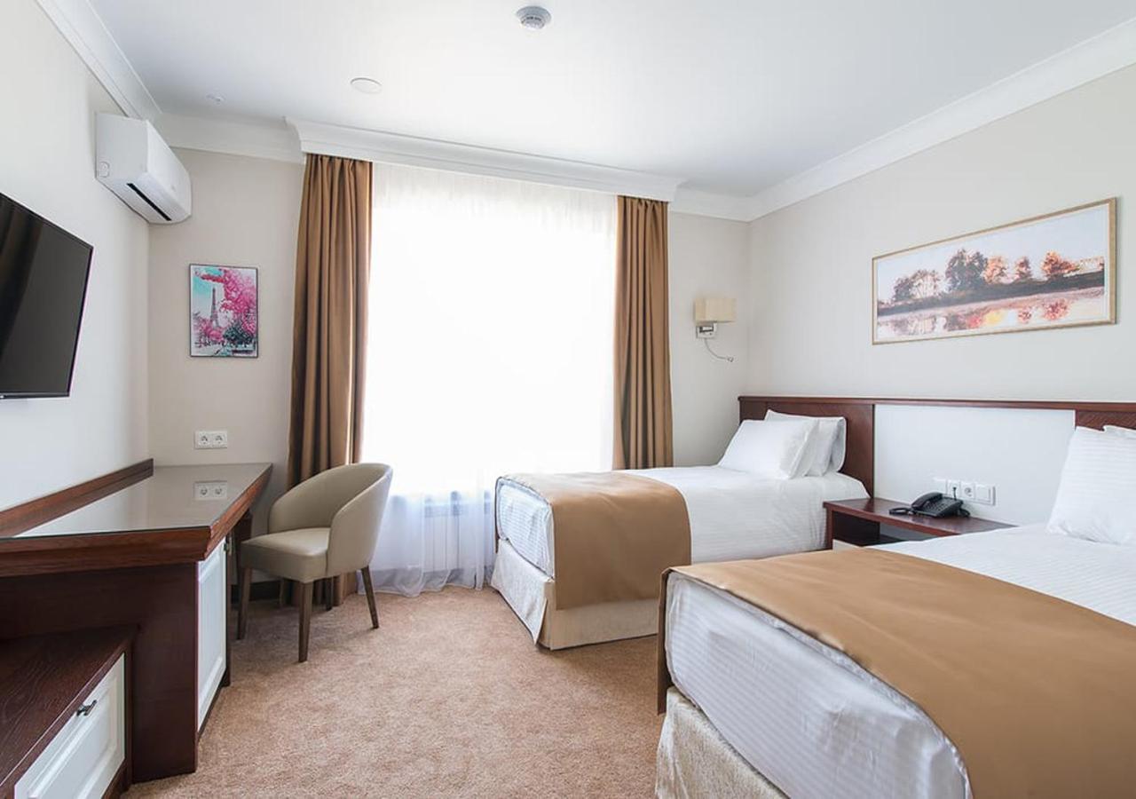 Boutique Hotel Kaspi Temirtau Buitenkant foto