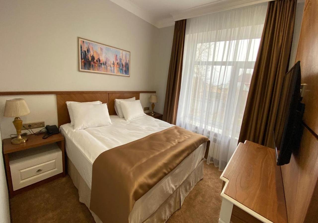 Boutique Hotel Kaspi Temirtau Buitenkant foto